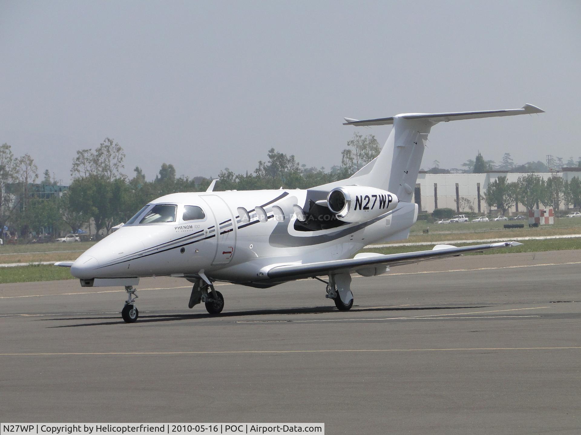 N27WP, 2009 Embraer EMB-500 Phenom 100 C/N 50000058, Phenom 100 by Embraer parked in transient parking