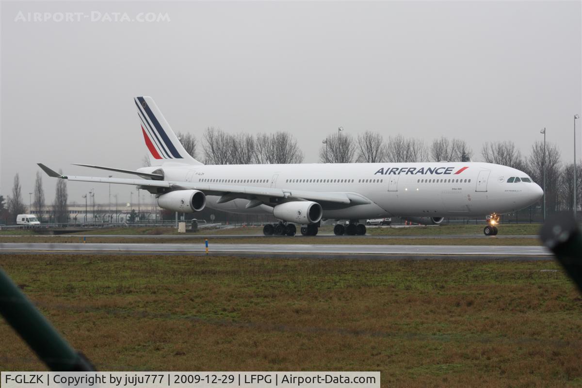 F-GLZK, 1997 Airbus A340-313X C/N 207, on transit at CDG whis new peint