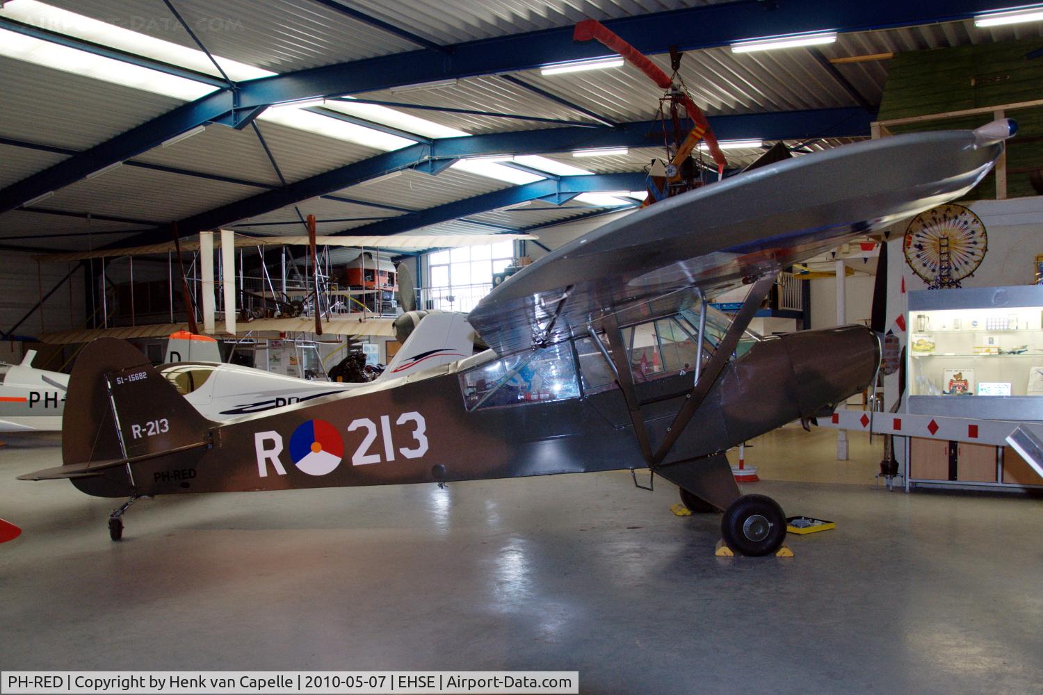 PH-RED, 1950 Piper L-21A Super Cub (PA-18-125) C/N 18-568, Piper Cub in the Flying Museum at Seppe airfield, the Netherlands. It used to be with the Royal Netherlands Air Force.