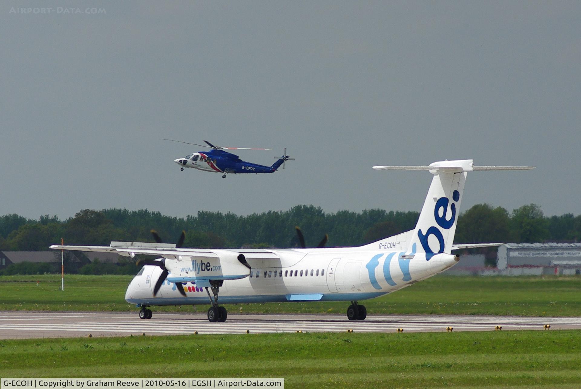 G-ECOH, 2008 De Havilland Canada DHC-8-402Q Dash 8 C/N 4221, Awaiting a Bristow helicopter to land before take off.