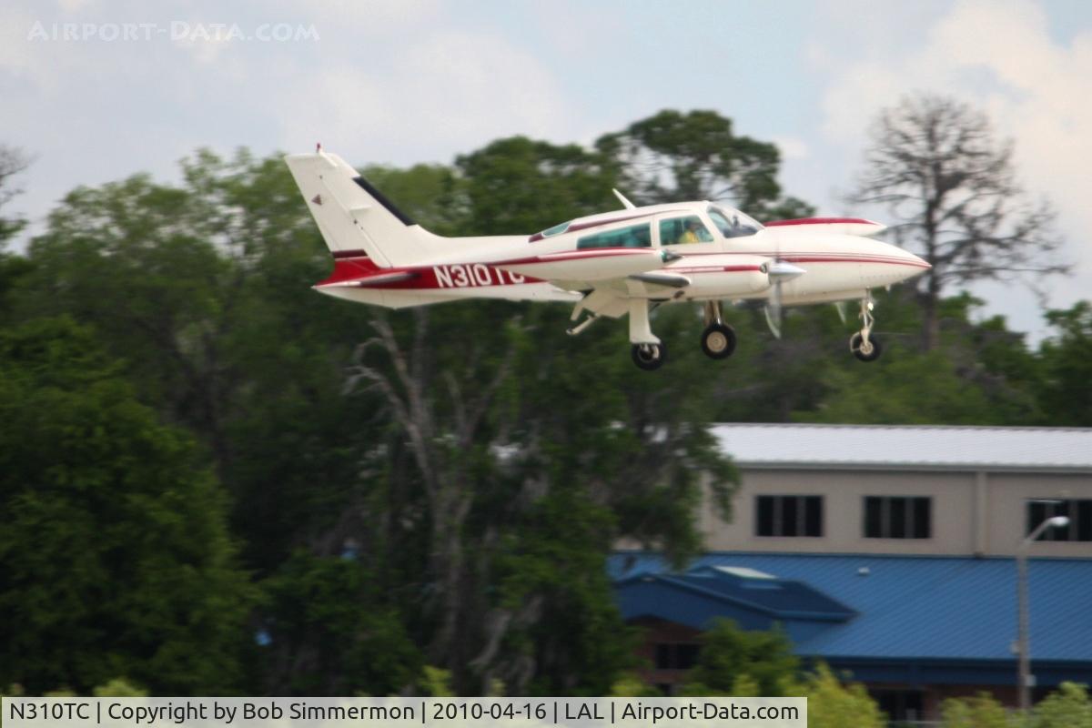 N310TC, 1979 Cessna 310R C/N 310R1603, Arriving at Lakeland, FL during Sun N Fun 2010.