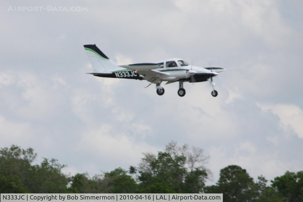 N333JC, 1967 Cessna 310L C/N 310L-0197, Arriving at Lakeland, FL during Sun N Fun 2010.
