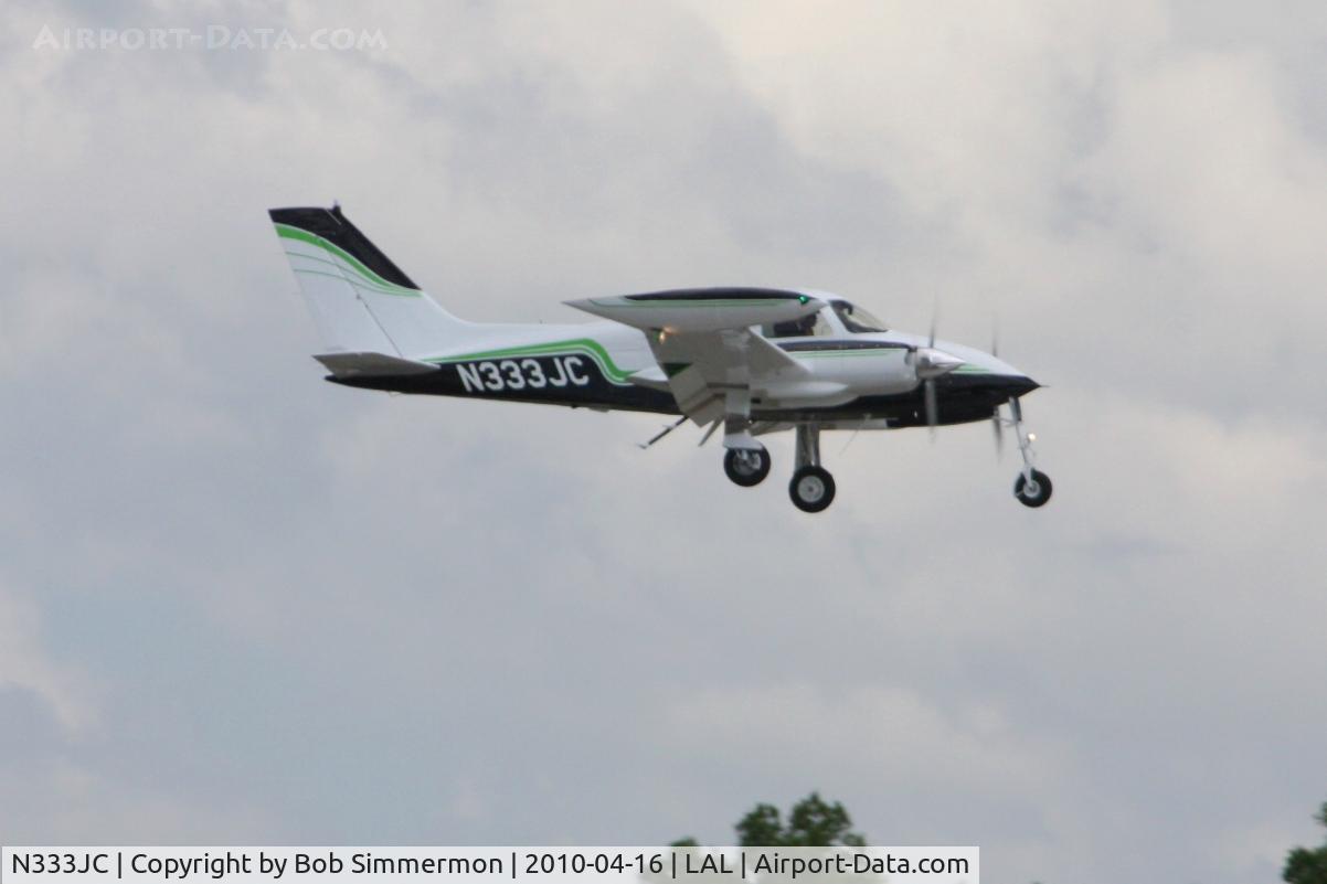 N333JC, 1967 Cessna 310L C/N 310L-0197, Arriving at Lakeland, FL during Sun N Fun 2010.