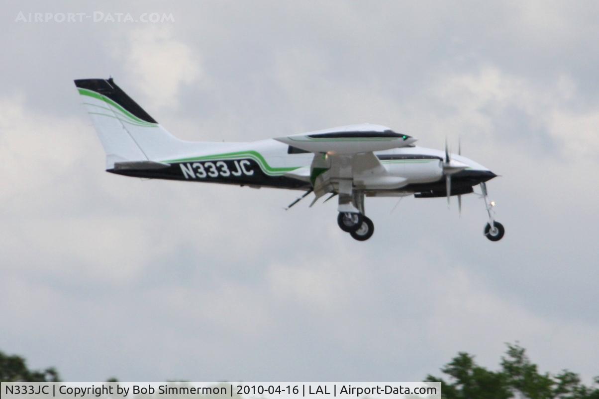 N333JC, 1967 Cessna 310L C/N 310L-0197, Arriving at Lakeland, FL during Sun N Fun 2010.