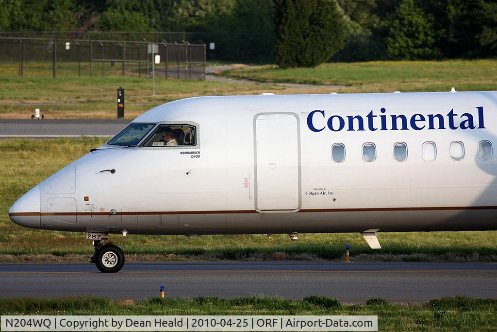 N204WQ, 2008 Bombardier DHC-8-402 Dash 8 C/N 4204, Continental Connection (Colgan Air) N204WQ taxiing to RWY 23 for departure to Newark Liberty Int'l (KEWR).