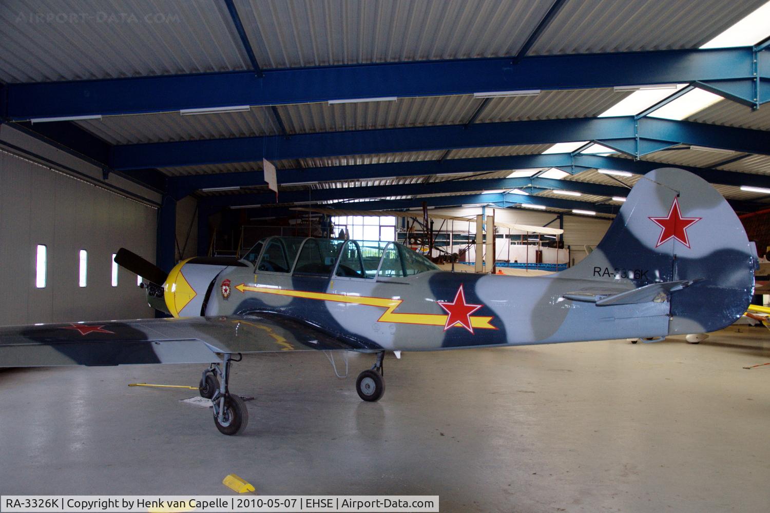 RA-3326K, 1987 Bacau Yak-52 C/N 877401, Yak-52 parked in the Flying Museum at Seppe airfield, the Netherlands.