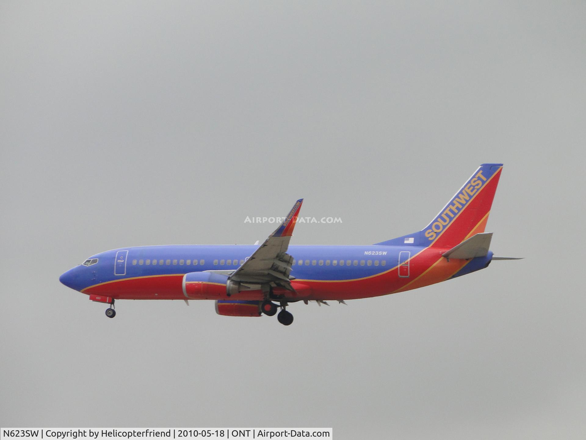 N623SW, 1996 Boeing 737-3H4 C/N 27933, On final on a cloudy, drizzly day at Ontario