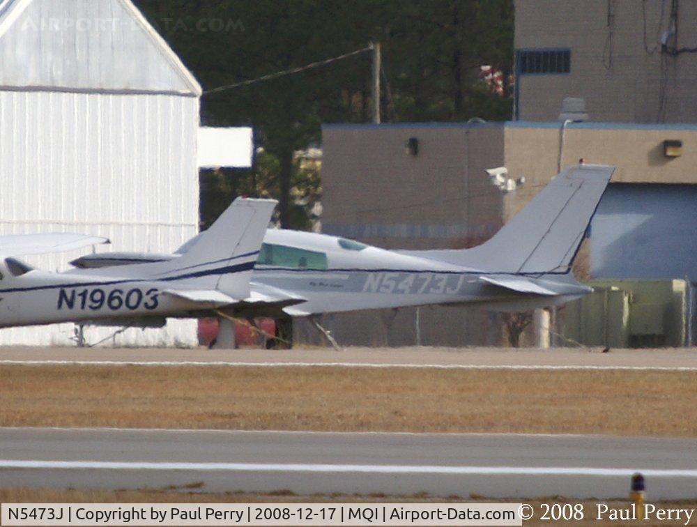 N5473J, 1975 Cessna 310R C/N 310R0271, Sitting out across the field