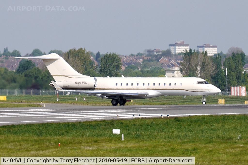 N404VL, 2001 Bombardier BD-700-1A11 Global Express C/N 9085, 2001 Bombardier BD-700-1A10 taxies out through the heat haze at Birmingham
