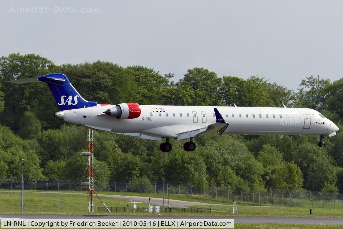LN-RNL, 2010 Bombardier CRJ-900LR (CL-600-2D24) C/N 15250, moments before touchdown