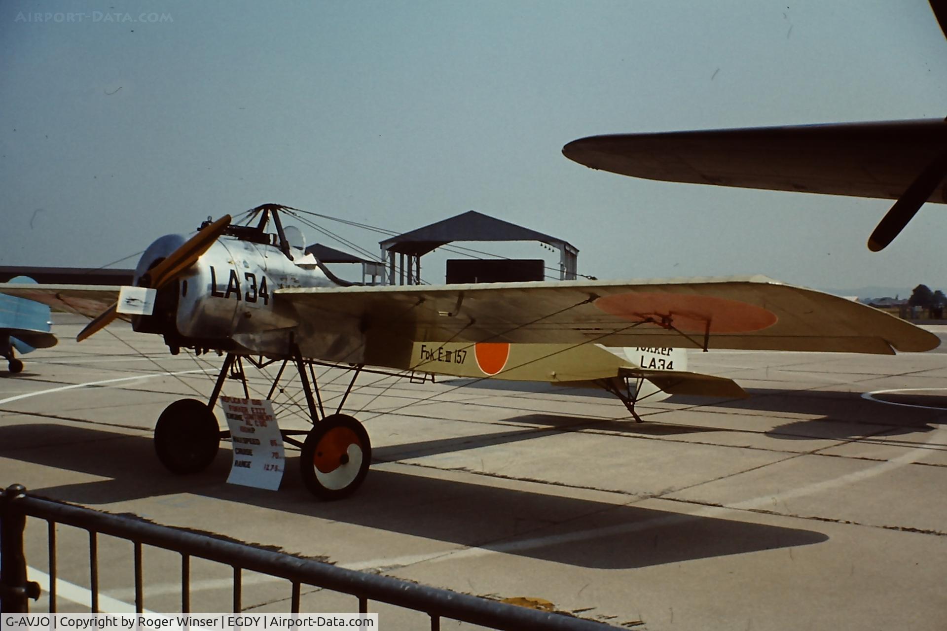 G-AVJO, 1967 Fokker EIII Replica C/N PPS/FOK/6, Marked as LA34/157 and early Dutch roundal. At RNAS Yeovilton Naval Air Day 2003?