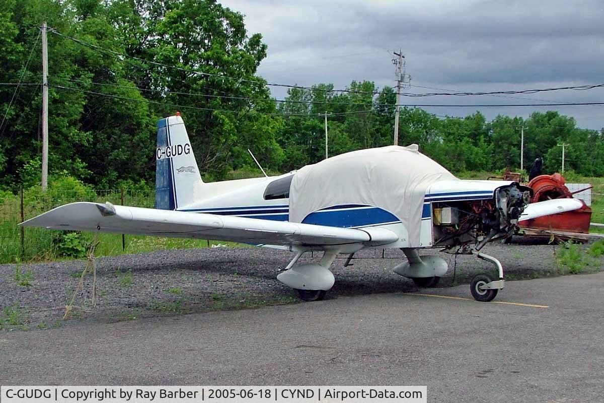C-GUDG, 1975 American Aviation AA-5A Traveler C/N AA5A-0039, Grumman_American AA-5A Cheetah [AA5A-0039] Gatineau~C 18/06/2005. Seen here at Gatineau would appear to be stored as no propeller and engine cover off and open to the eliments.