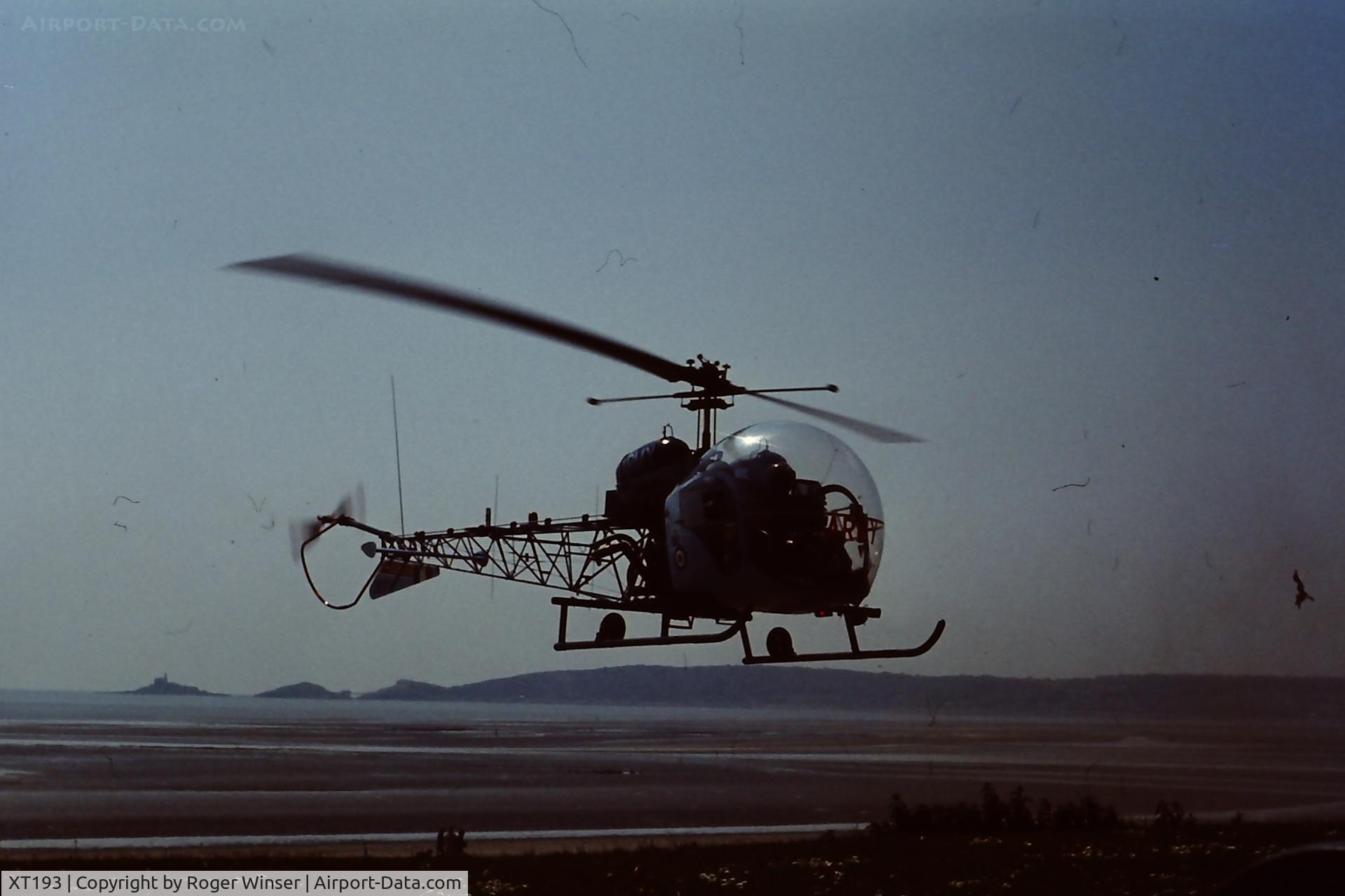 XT193, 1965 Westland Sioux AH.1 C/N WA352, Off airport. Army Air Corps Blue Eagles helicopter arriving at the Swansea Bay Air Show, Wales in the early 1970's