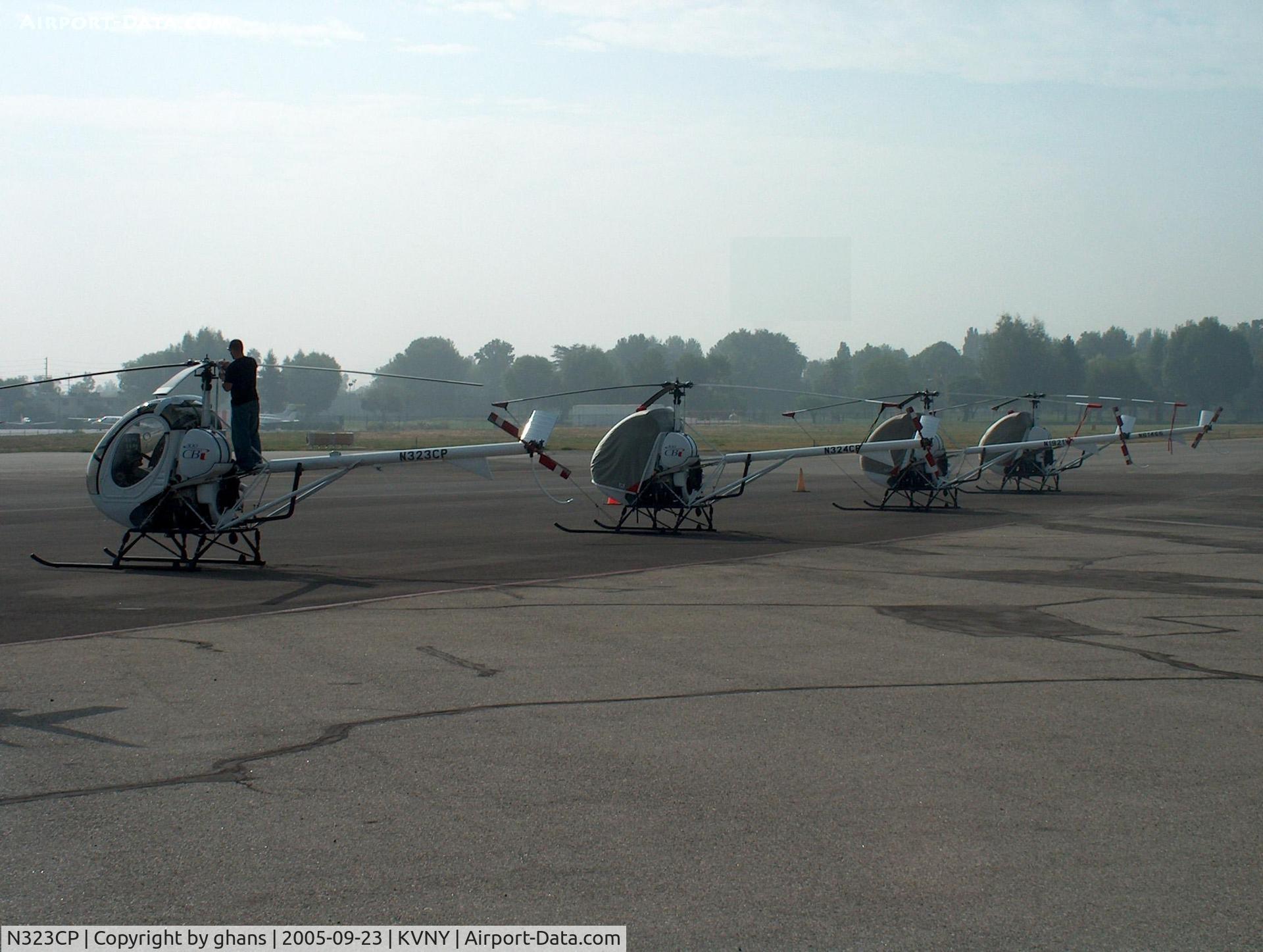 N323CP, 2004 Schweizer 269C-1 C/N 0181, Early morning check