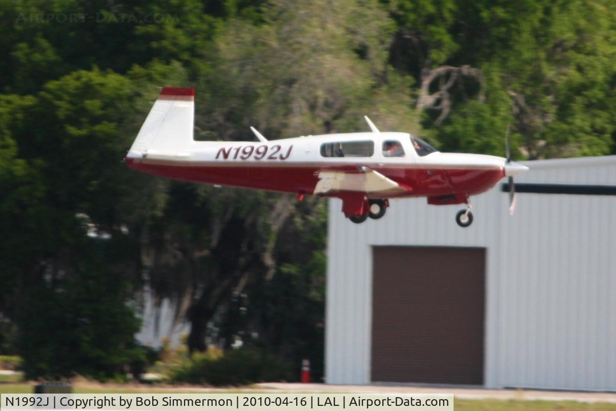 N1992J, 1999 Mooney M20S Eagle C/N 30-0042, Landing on 9 during Sun N Fun 2010 at Lakeland, FL.