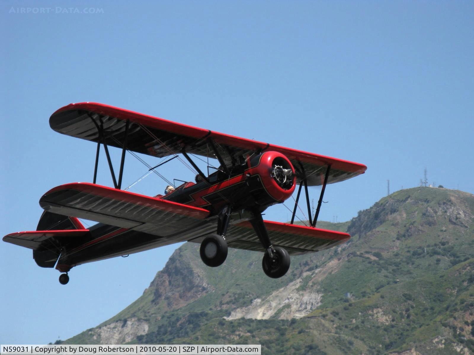 N59031, 1941 Boeing A75N1(PT17) C/N 75-3808, 1941 Boeing Stearman A75N1, Continental W670 220 Hp, takeoff climb Rwy 22