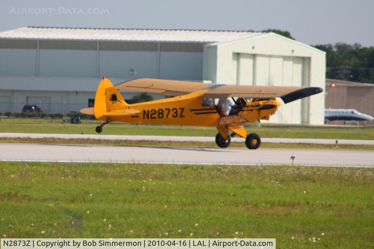 N2873Z, 1959 Piper PA-18A 150 Super Cub C/N 18-7036, Departing Lakeland, FL during Sun N Fun 2010