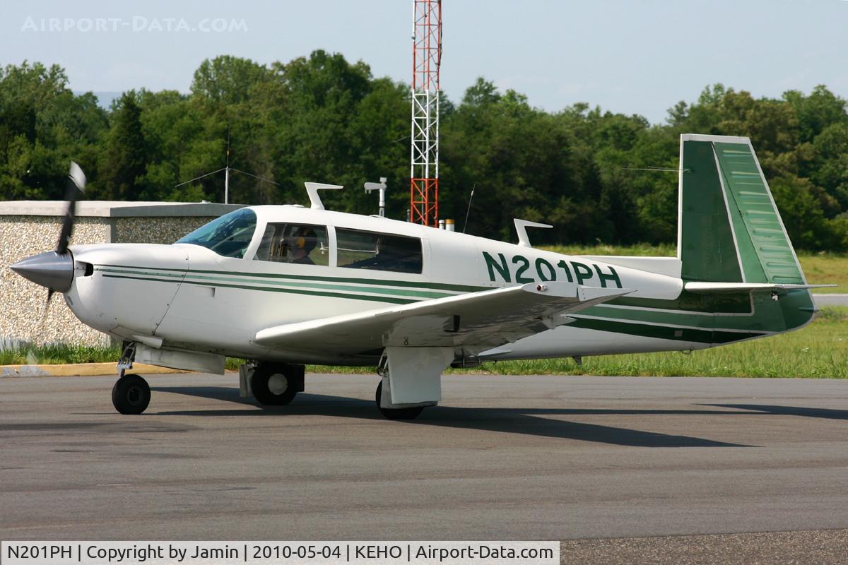 N201PH, 1977 Mooney M20J 201 C/N 24-0116, Pulling up to the pumps.