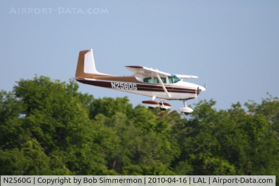 N2560G, 1959 Cessna 182B Skylane C/N 51860, Arriving at Lakeland, FL during Sun N Fun 2010.