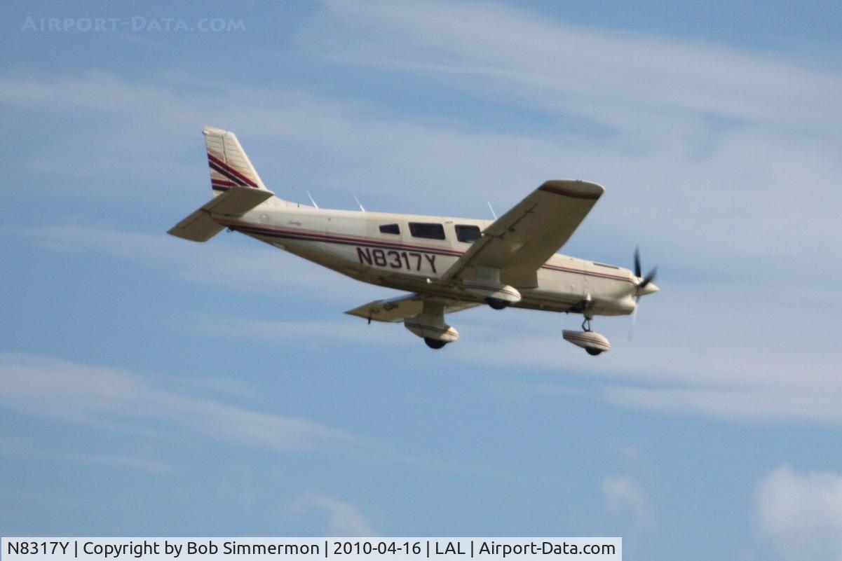 N8317Y, 1980 Piper PA-32-301T Saratoga C/N 32-8124005, Arriving at Lakeland, FL during Sun N Fun 2010.