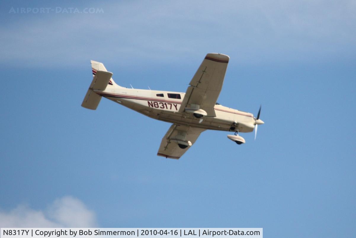 N8317Y, 1980 Piper PA-32-301T Saratoga C/N 32-8124005, Arriving at Lakeland, FL during Sun N Fun 2010.