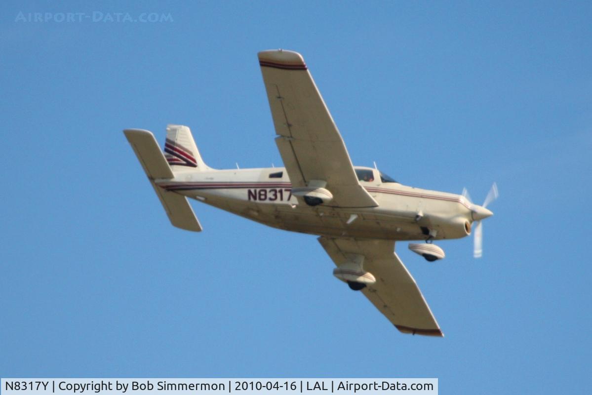 N8317Y, 1980 Piper PA-32-301T Saratoga C/N 32-8124005, Arriving at Lakeland, FL during Sun N Fun 2010.