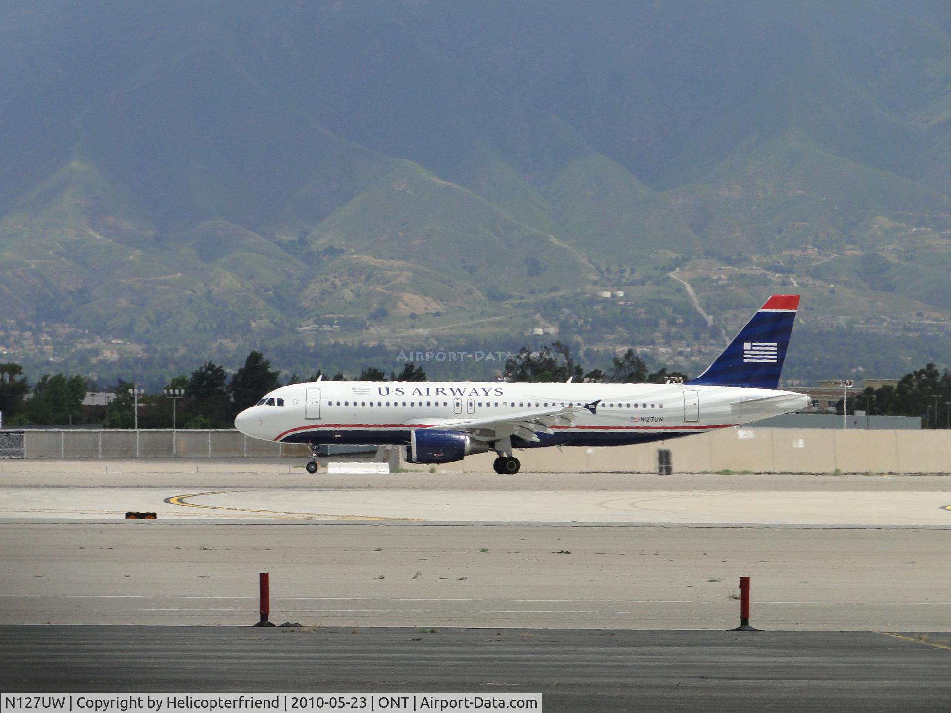 N127UW, 2010 Airbus A320-214 C/N 4202, Rolling out after landing on runway 26R