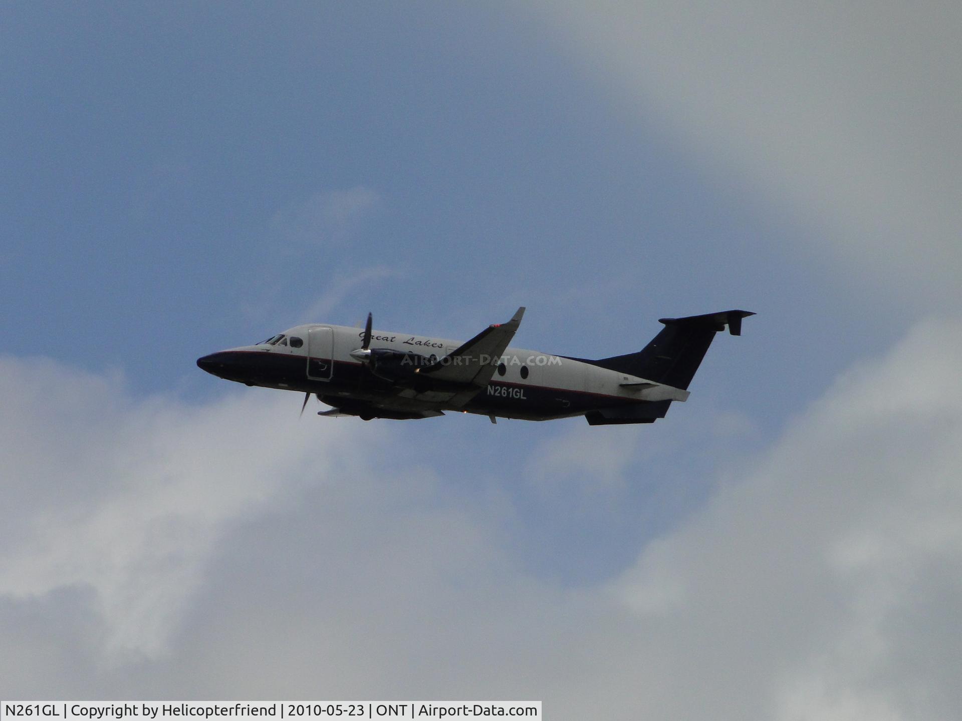 N261GL, 1996 Raytheon Aircraft Company 1900D C/N UE-261, Airbourne after lifting off runway 26R