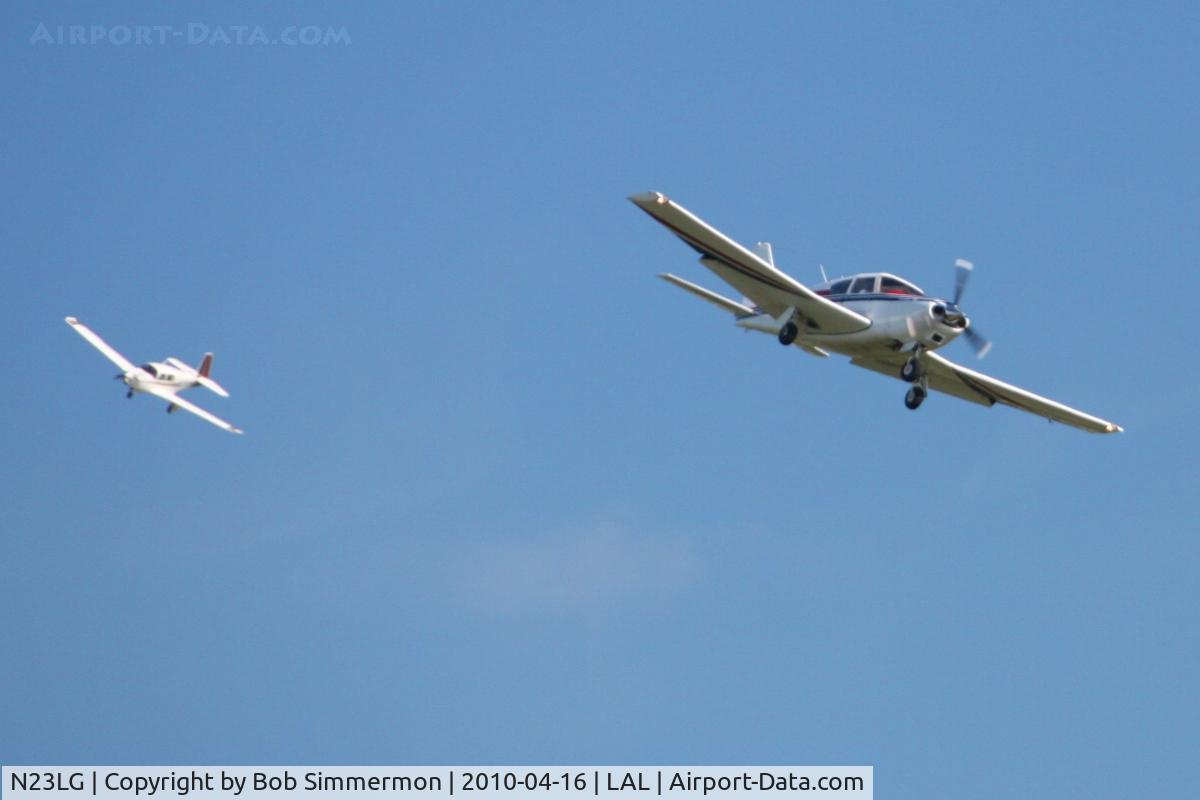 N23LG, 1959 Piper PA-24-250 Comanche C/N 24-832, Arriving at Lakeland, FL during Sun N Fun 2010 with N57039 close behind..