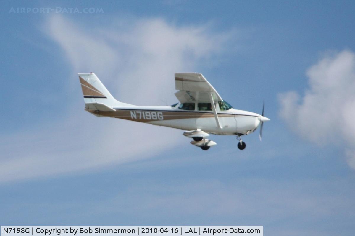 N7198G, 1969 Cessna 172K Skyhawk C/N 17258898, Arriving at Lakeland, FL during Sun N Fun 2010.