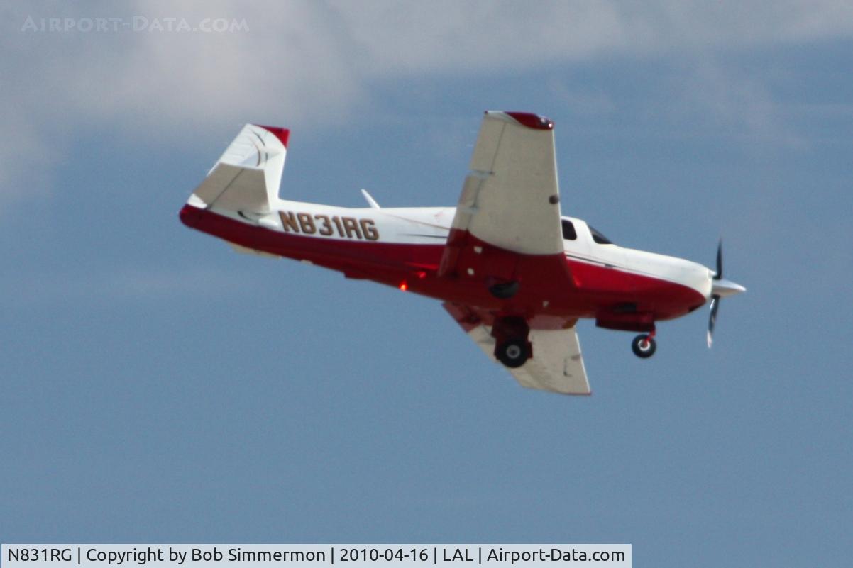 N831RG, 1999 Mooney M20R Ovation C/N 29-0182, Arriving at Lakeland, FL during Sun N Fun 2010.