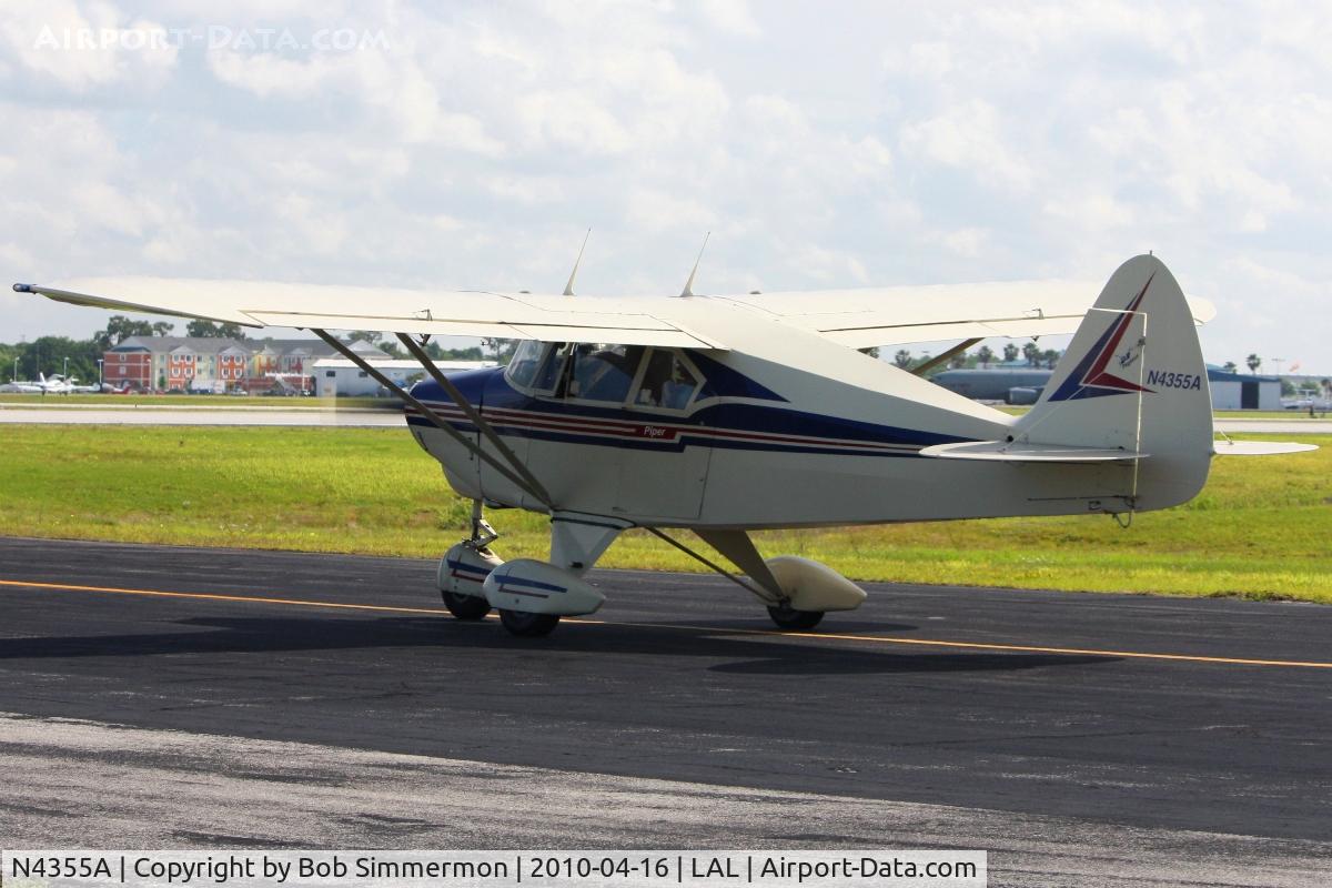 N4355A, 1956 Piper PA-22-150 C/N 22-3711, Departing Lakeland, FL during Sun N Fun 2010