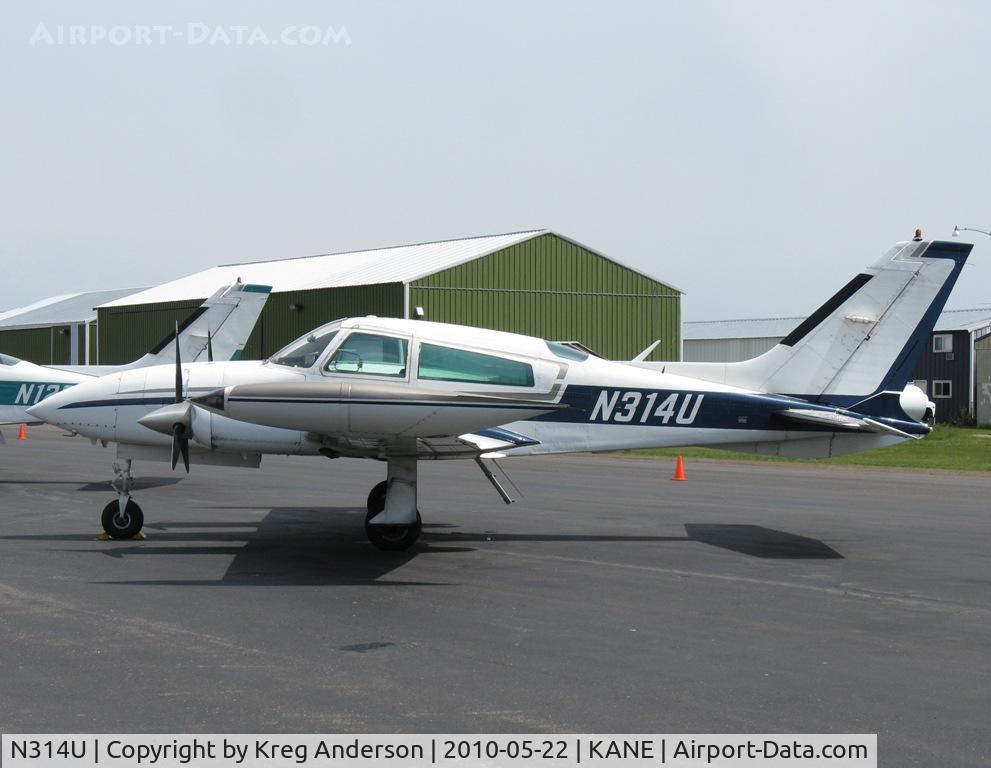 N314U, 1979 Cessna 310R C/N 310R1852, Parked on a ramp by one of the FBOs.