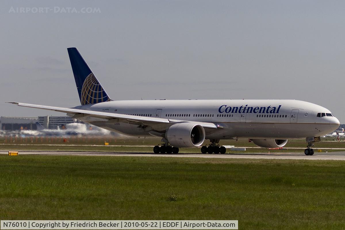 N76010, 1999 Boeing 777-224/ER C/N 29480, departing via RW18W