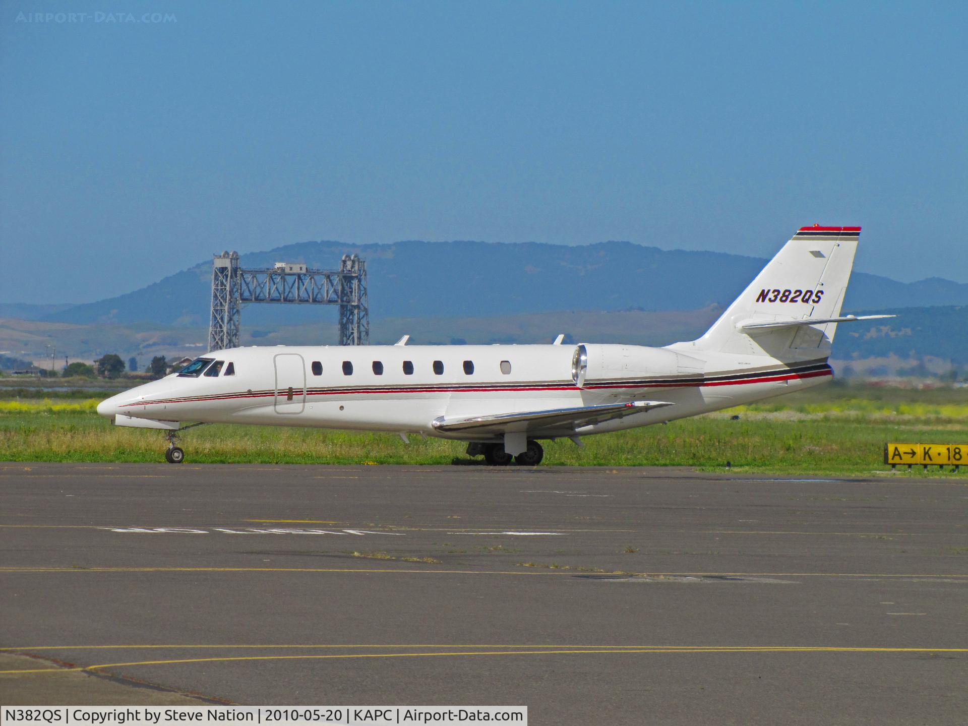 N382QS, 2008 Cessna 680 Citation Sovereign C/N 680-0245, NetJets Cessna 680 arriving KAPC from Houston Executive (KTME) with Napa River RR Bridge in background