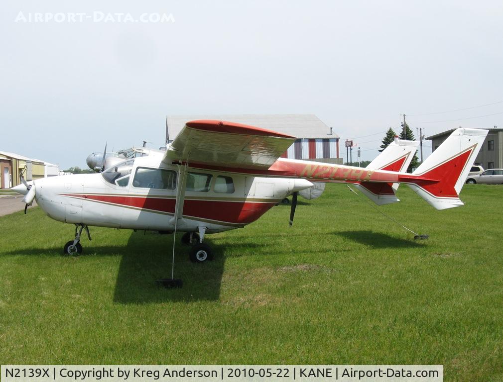 N2139X, 1965 Cessna 337 Super Skymaster C/N 337-0039, Parked on a ramp by one of the FBOs.