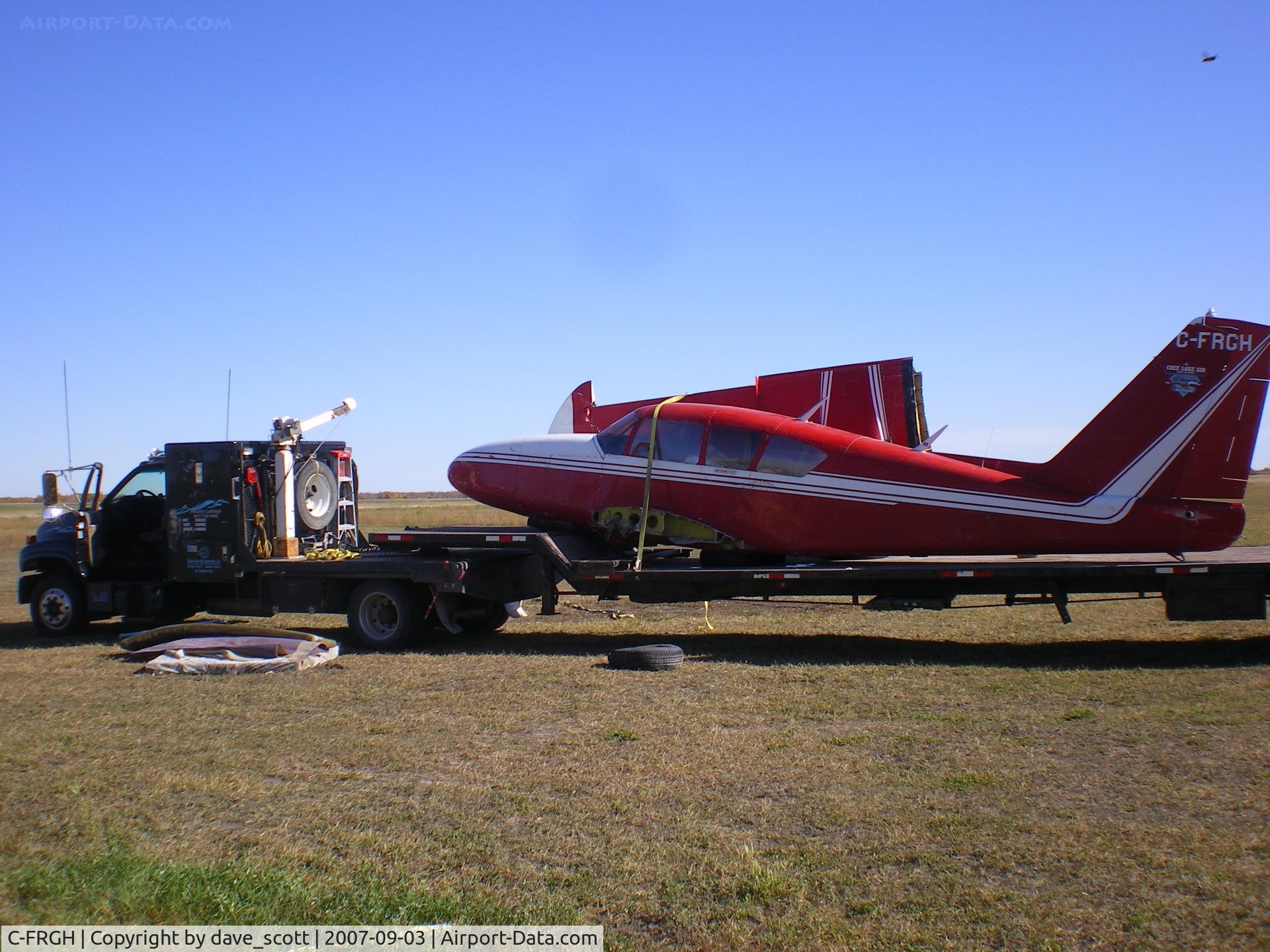 C-FRGH, 1964 Piper PA-23-250 C/N 27 2577, flew low between some trees by Saskatoon