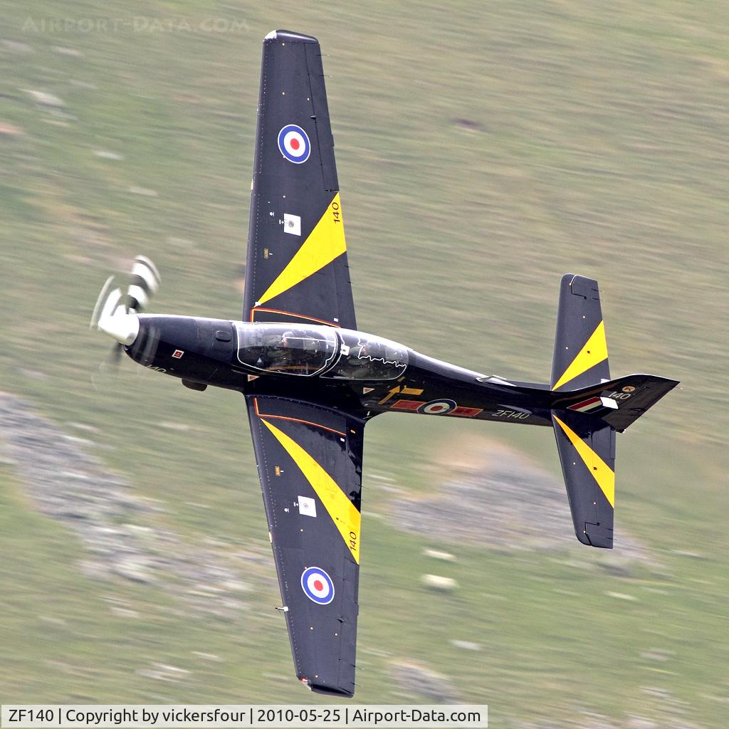 ZF140, 1988 Short S-312 Tucano T1 C/N S006/T6, Royal Air Force. Operated by 31 Squadron un-marked, coded '051'. M6 Pass, Cumbria.