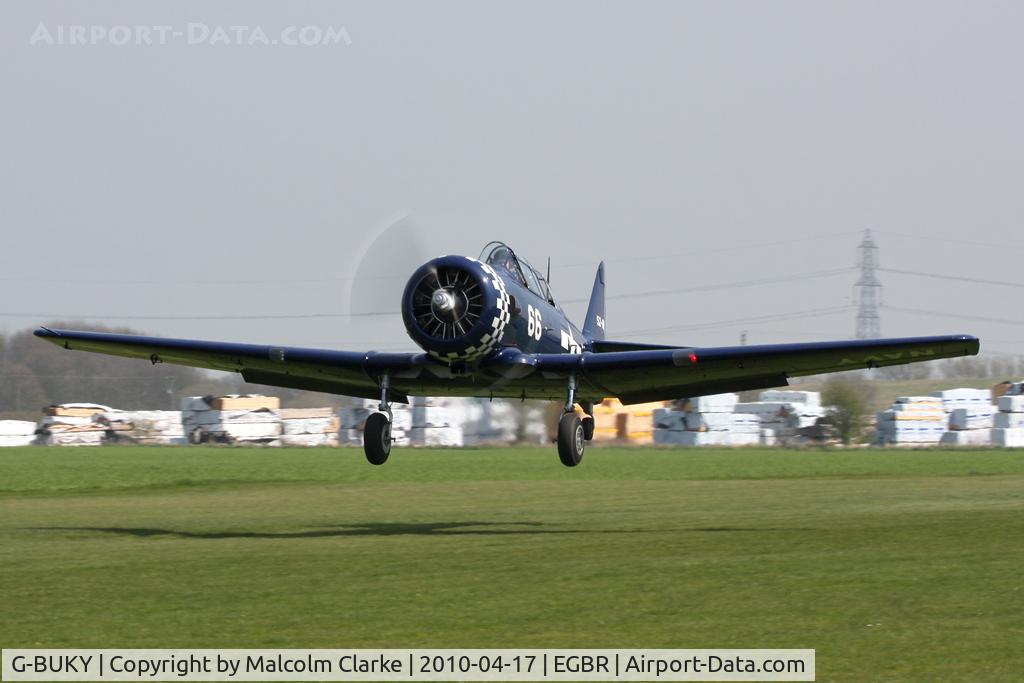 G-BUKY, 1952 Canadian Car & Foundry T-6H Harvard Mk.4M C/N CCF4-464, CCF T-6J Harvard Mk4 on take-off at Breighton Airfield, UK in 2010.