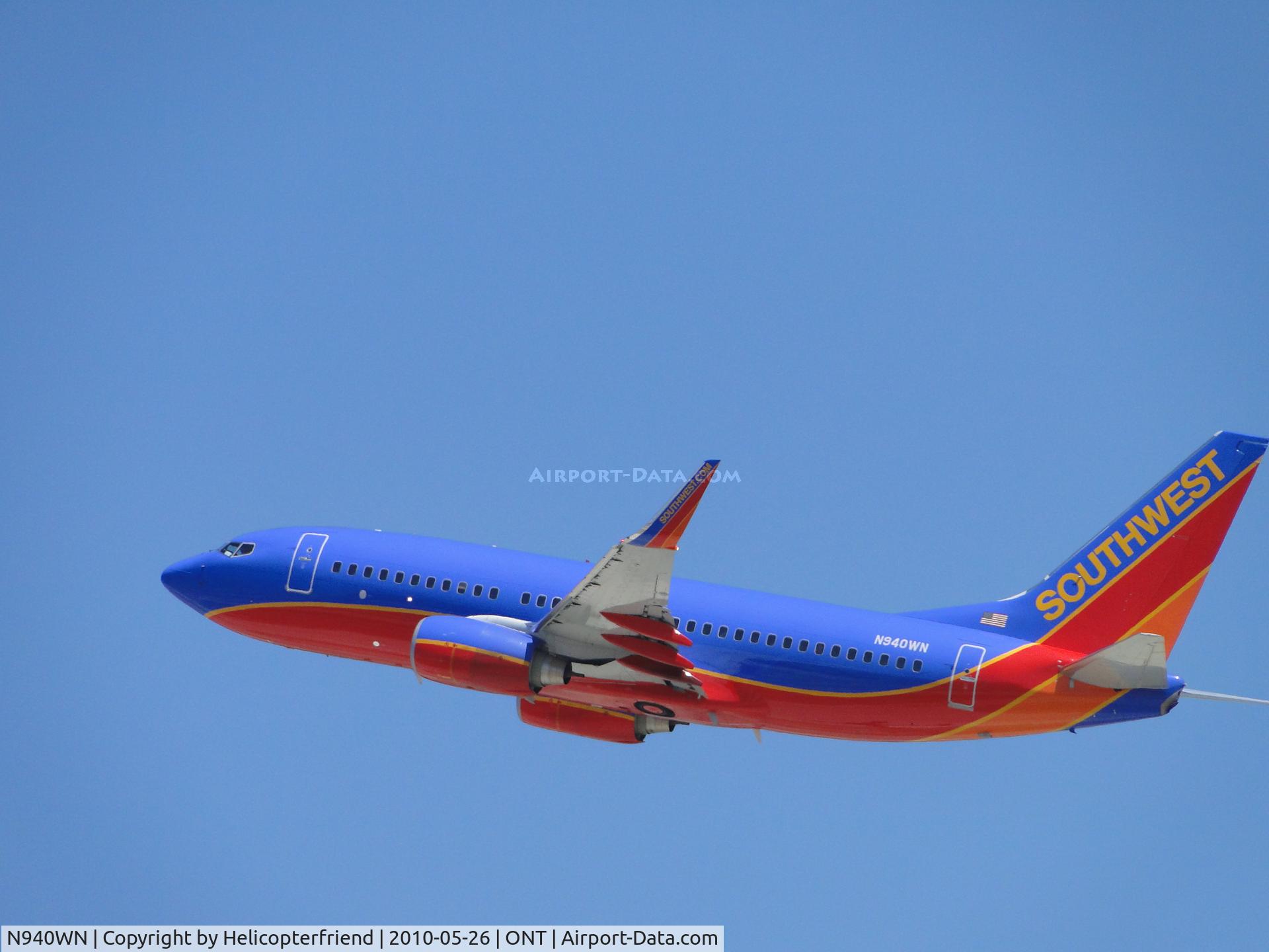 N940WN, 2009 Boeing 737-7H4 C/N 36900, Take off from 26L