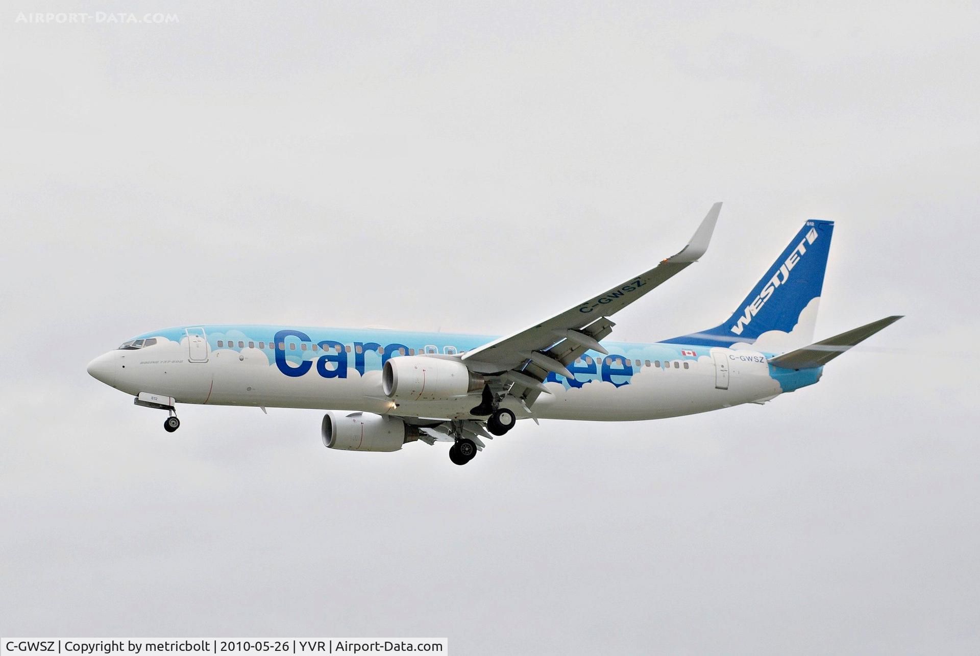 C-GWSZ, 2010 Boeing 737-8CT C/N 37092, Landing at YVR on a dull and dreary 
