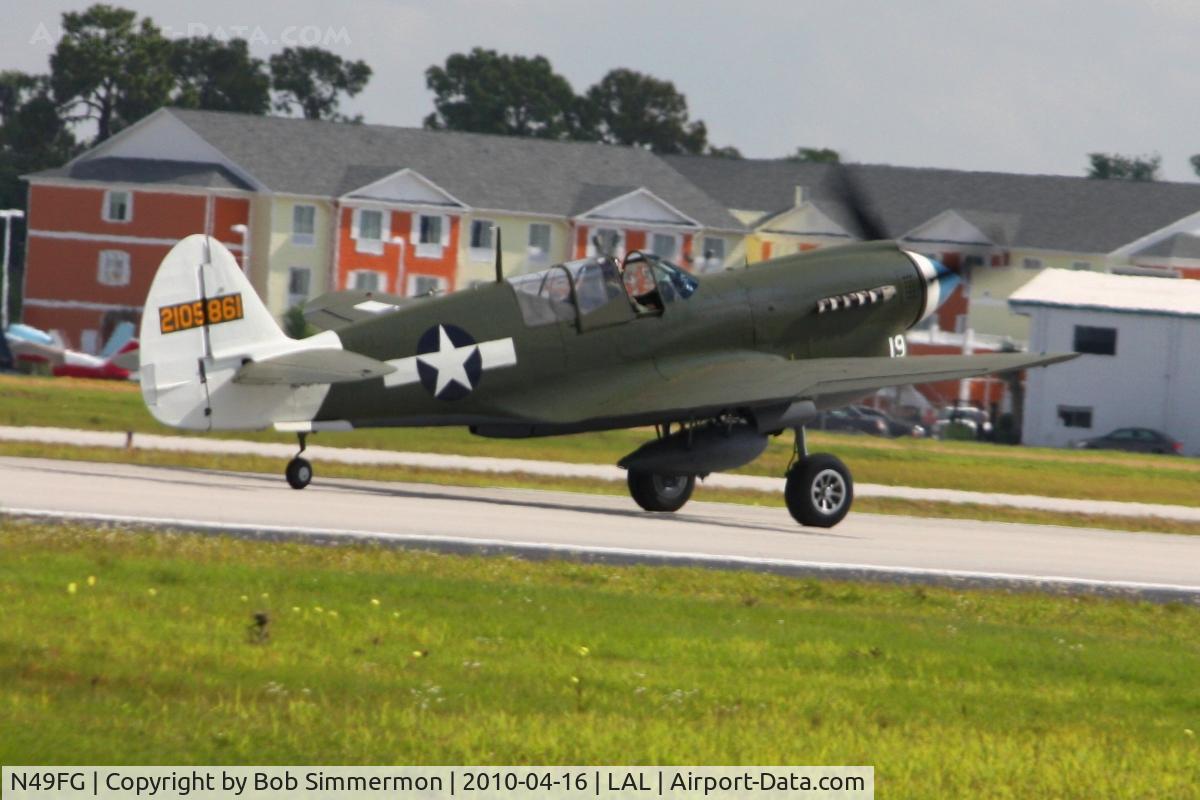 N49FG, 1943 Curtiss P-40N Warhawk C/N 29623, Departing Lakeland, Florida during Sun N Fun 2010.