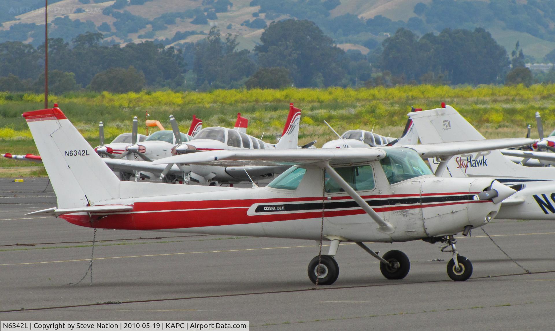 N6342L, 1980 Cessna 152 C/N 15284387, Cessna 152 on transient line at Napa, CA