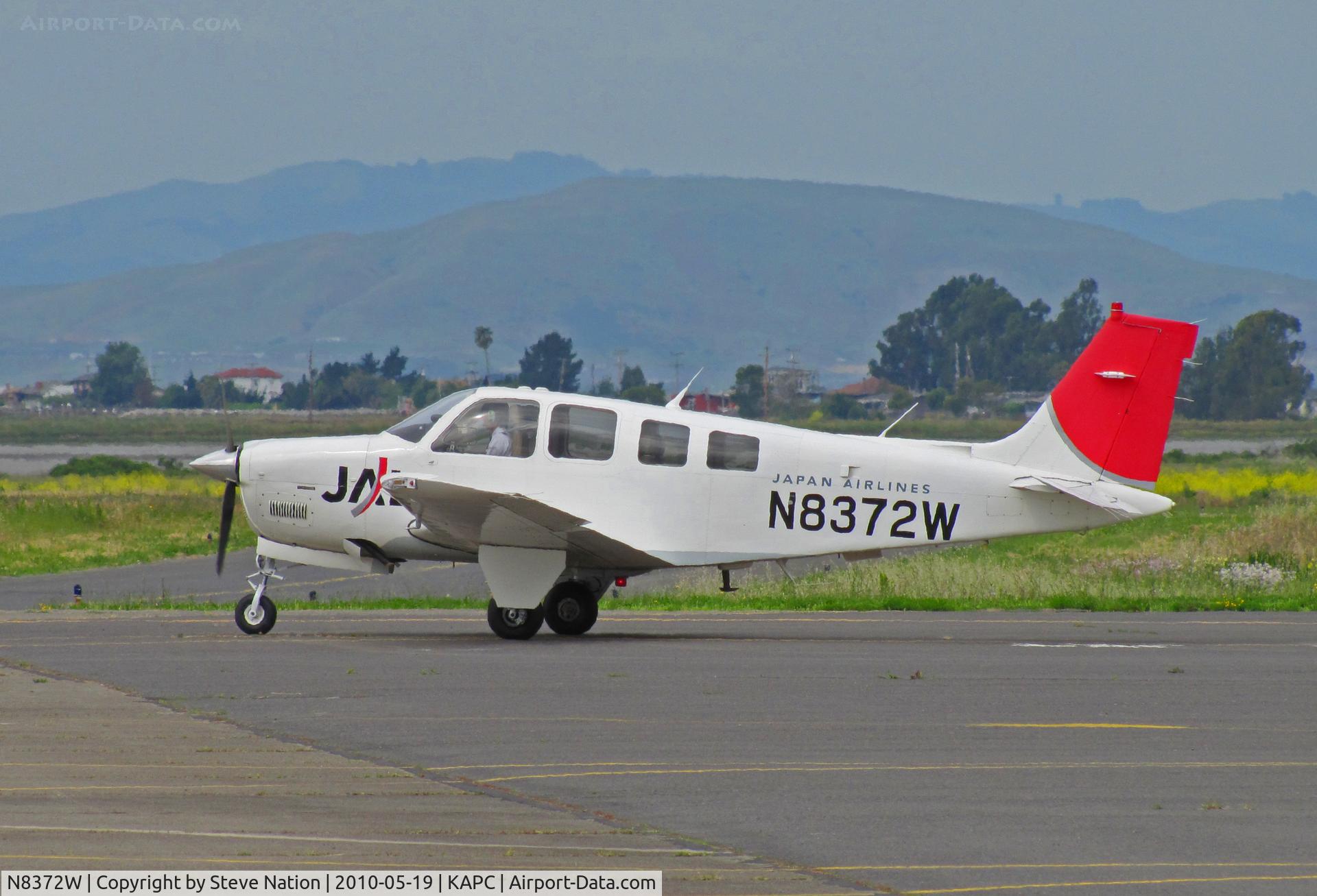 N8372W, 2004 Raytheon Aircraft Company A36 Bonanza C/N E-3573, JAL student heads out for morning flight at Napa, CA training base in Raytheon A36 in old colors