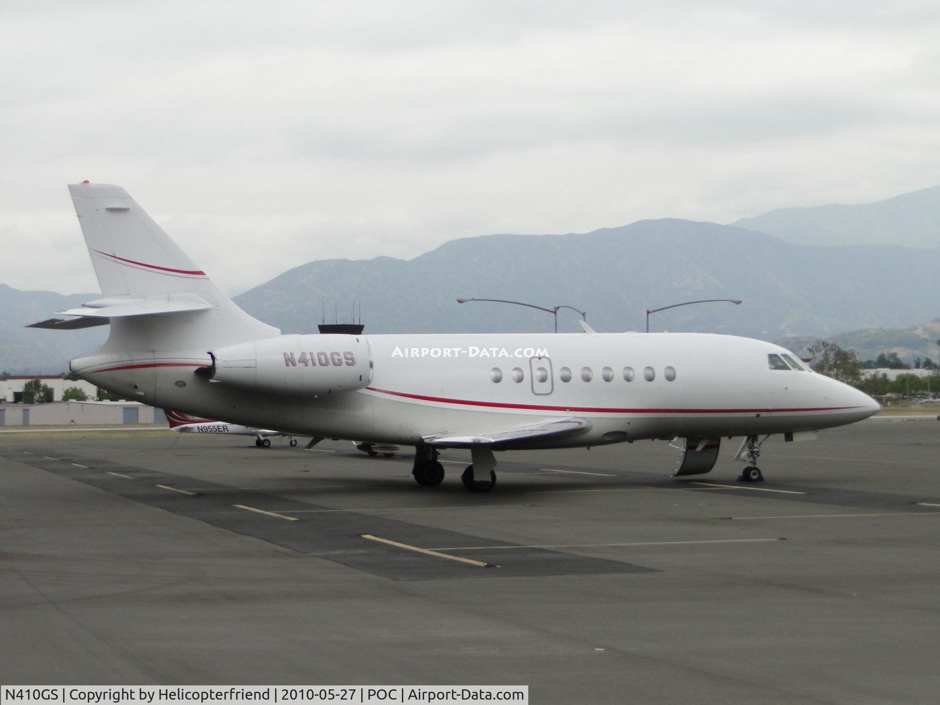 N410GS, 2000 Dassault Falcon 2000 C/N 112, Parked in transient parking with door open waiting for crew and passengers
