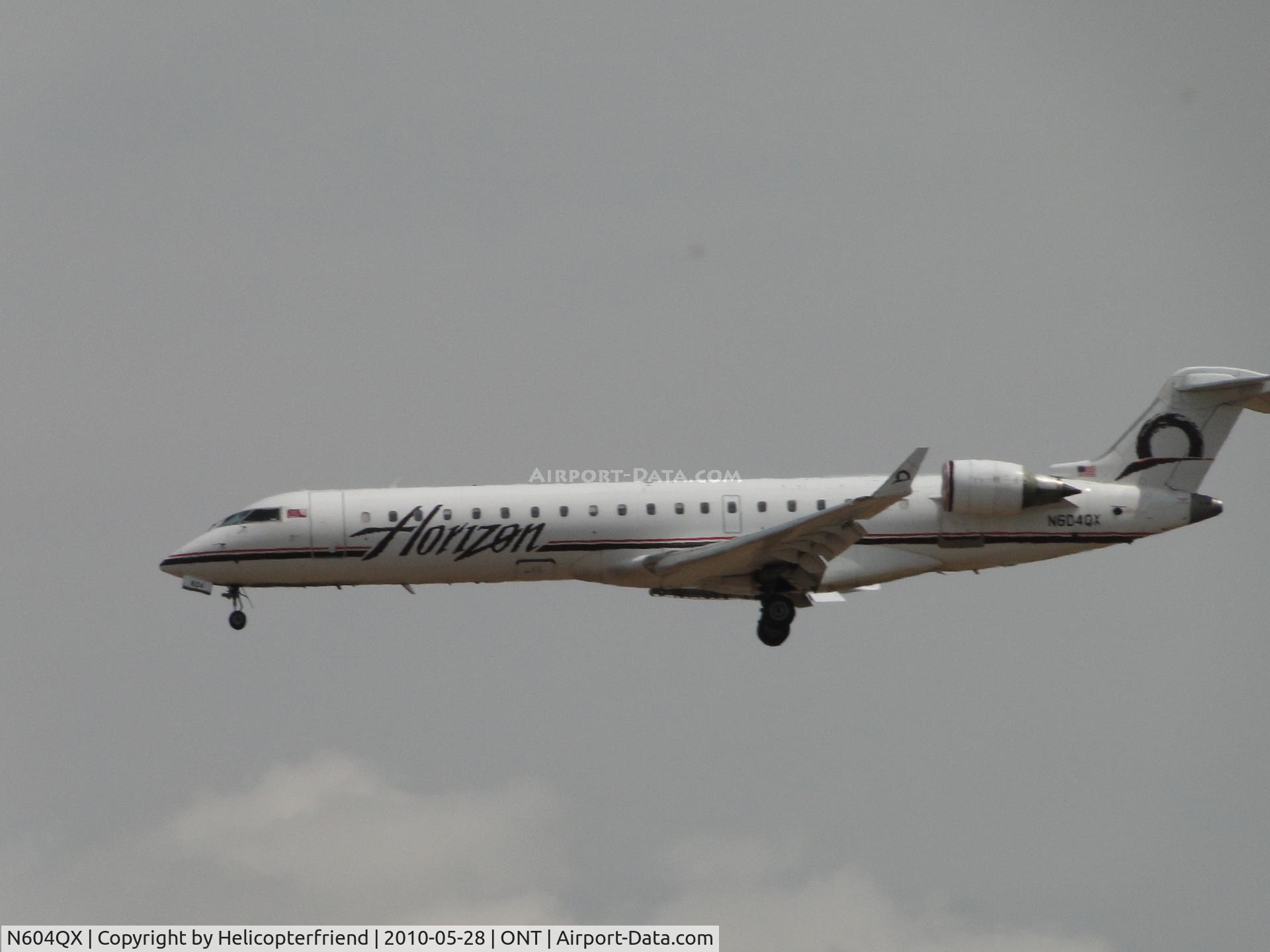 N604QX, 2001 Bombardier CRJ-701 (CL-600-2C10) C/N 10019, On final to 26R