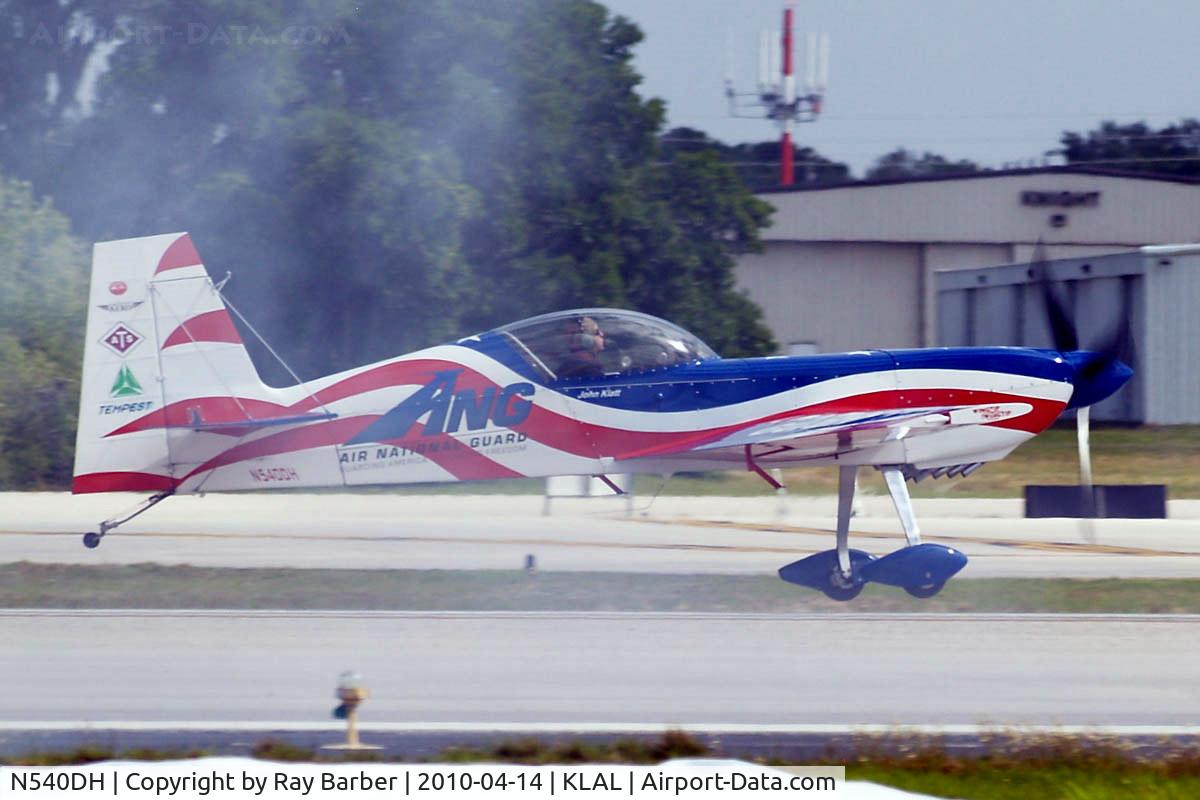 N540DH, 1995 Staudacher S-300D C/N 20,  Staudacher S.300D [20] Lakeland-Linder~N 14/04/2010. Landing through the smoke from its display companion who had landed just ahead having shut down the smoke late at Sun & Fun 2010.