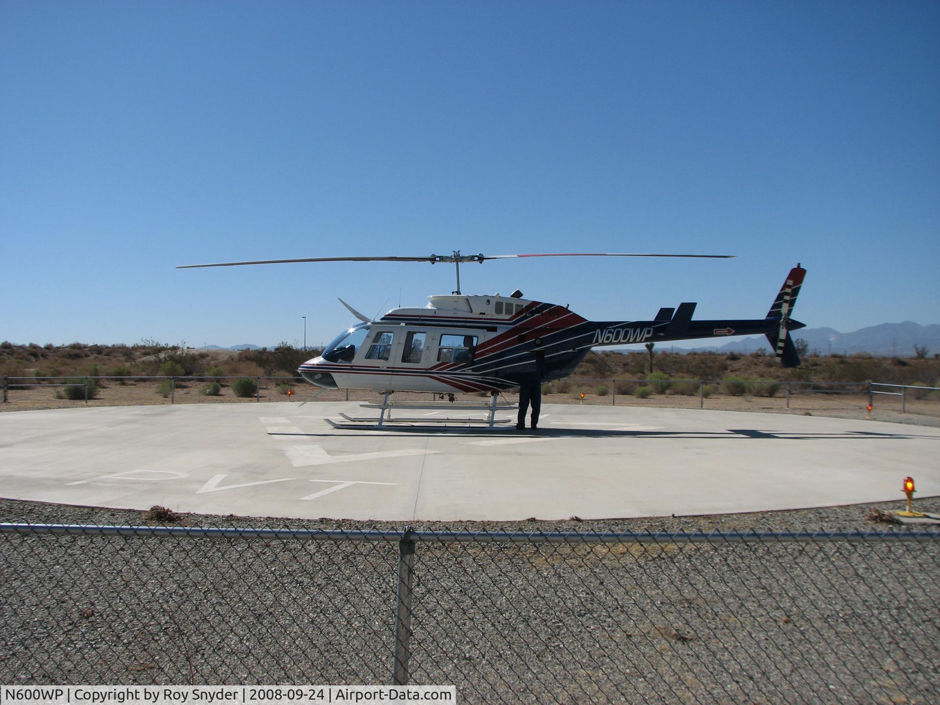 N600WP, 1988 Bell 206L-3 LongRanger III C/N 51250, Los Angeles Department of Water and Power Helicopter Zero Whiskey Papa on the pad at the Adelanto Converter Station.  Once upon a time we patrolled power lines on horse back.  How times have changed.