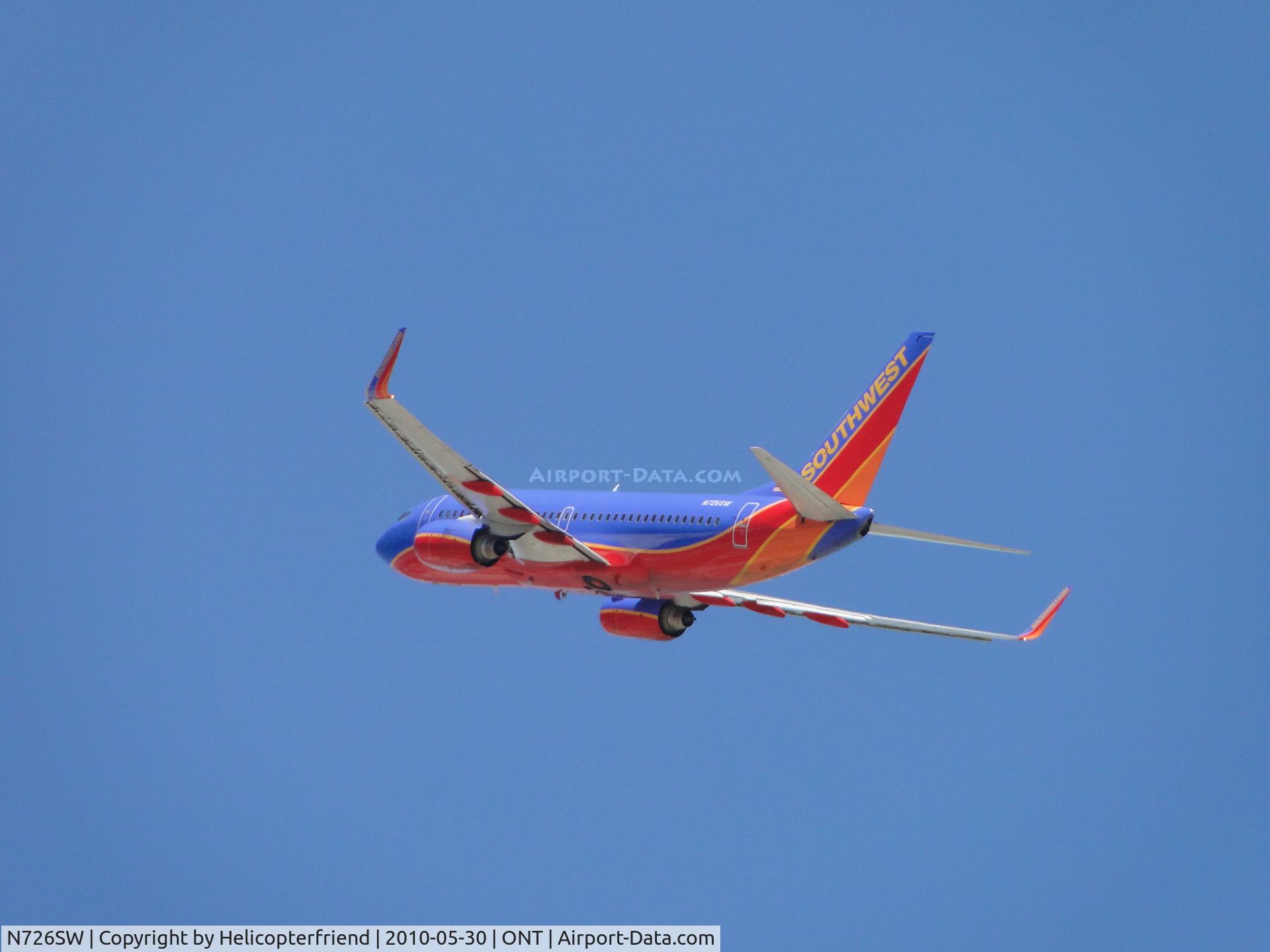 N726SW, 1999 Boeing 737-7H4 C/N 27858, Departing Ontario westbound from runway 26R