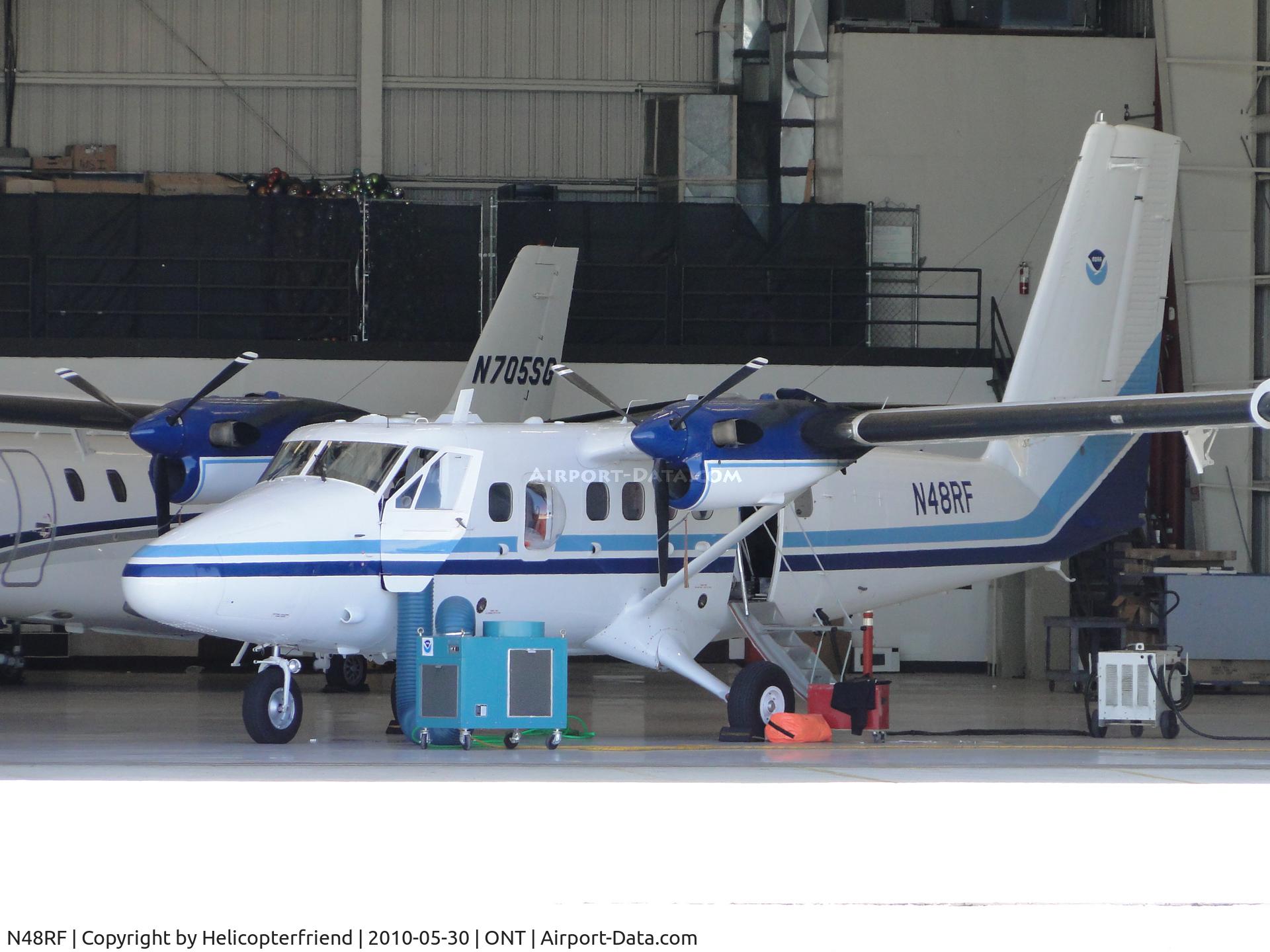 N48RF, 1981 De Havilland Canada DHC-6-310 Twin Otter C/N 740, Parked in the shade of a hanger at Ontario